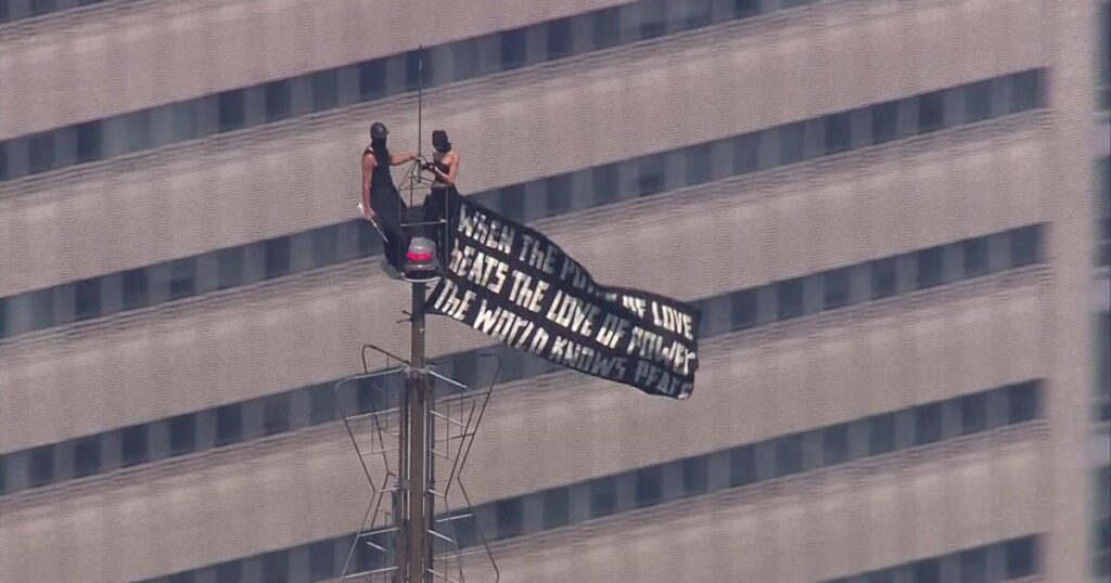Write a new simple attractive title based on the title from 2 Empire State Building climbers in custody after apparently getting engaged at the top and dont use quote marks Write a new simple attractive title based on the title