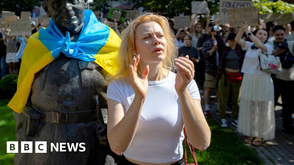 Write a new simple attractive title based on the title from Protests in Ukrainian cities against Zelensky’s removal of defence minister Fedorov and dont use quote marks Write a new simple attractive title based on the title