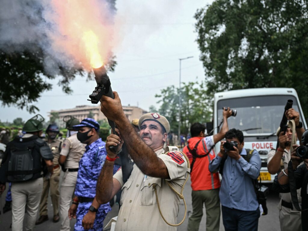 Write a new simple attractive title based on the title from Police attack Cockroach activists as thousands march on Indian parliament | Protests News and dont use quote marks Write a new simple attractive title based on the title