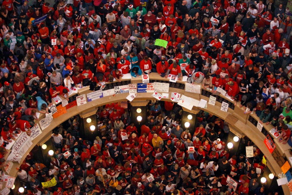 Write a new simple attractive title based on the title from Wisconsin’s appeals court overturns ruling striking down anti-union law and dont use quote marks Write a new simple attractive title based on the title