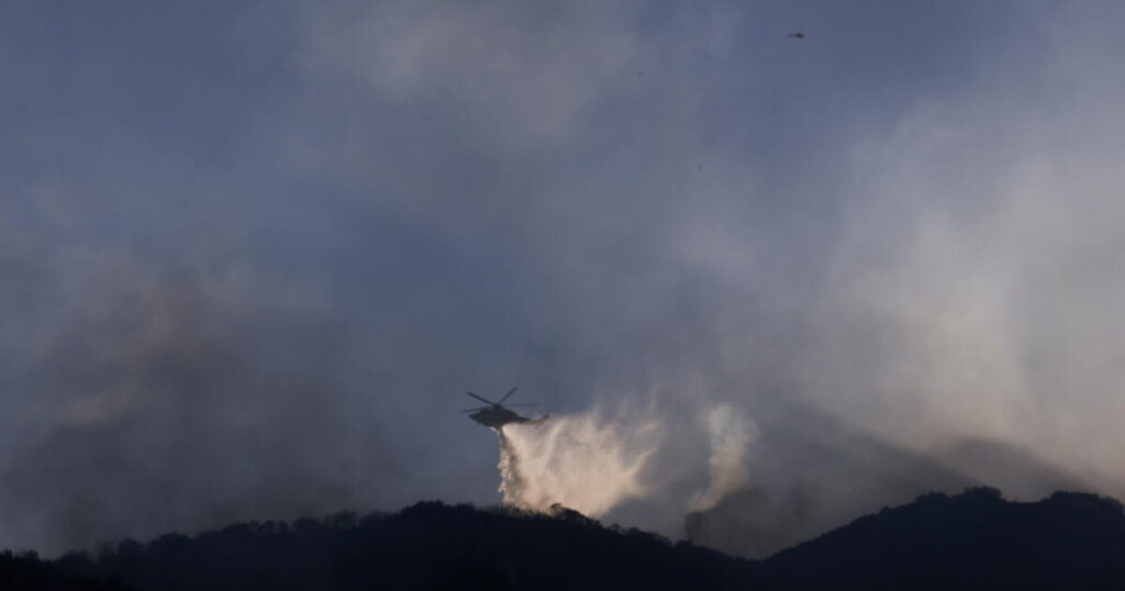 Write a new simple attractive title based on the title from Evacuations lifted in fire burning near Getty Center and dont use quote marks Write a new simple attractive title based on the title